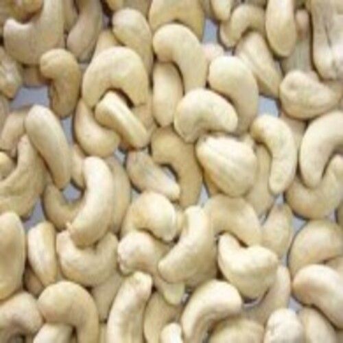 Cashew Nuts - Dried Standard Size, Curve Oval Shape | Natural Taste, Rich Nutrition, Safe Packaging, Perfect for Human Consumption