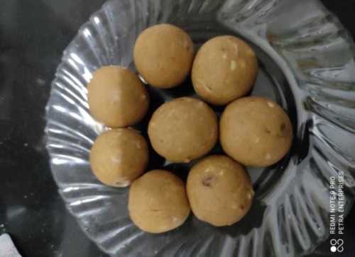 Besan Ladoo With Made From Besan, Fat And Sugar, Chopped Nuts, Raisins