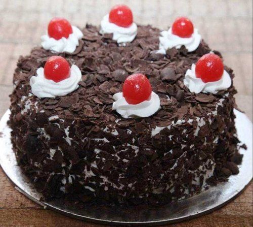 Delicious And Fresh Strawberry Round Black Forest Cake For Birthday Celebration