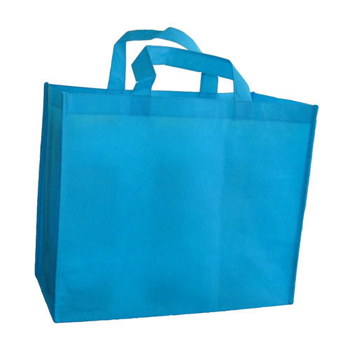  खरीदारी के उपयोग के लिए हैंडल के साथ नीले रंग का प्लेन डाइड नॉन वेवन कैरी बैग