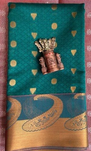 Green Kanchipuram Woven Zari Work Raw Silk Saree With Unstitched Blouse Piece