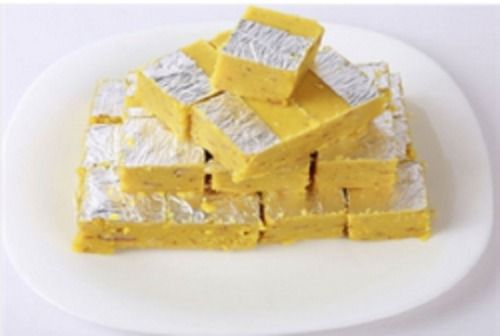 Good For Health 100 Percent Pure And Fresh Yellow Color With Grey Color Mixed Square Shape Milk Sweet