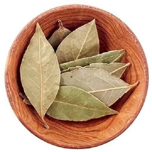 Dry Bay Leaf Aromatic Herb Brittle Texture Almond Shape Green In Color For Cooking