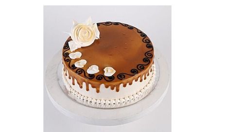 1 Kg Fresh And Delicious Caramel Cake With New Flower Design Fat Contains (%): 5 Grams (G)