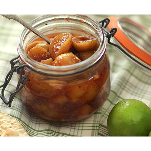 Spicy Mixed Vegetable And Lime Pickle Served With Food