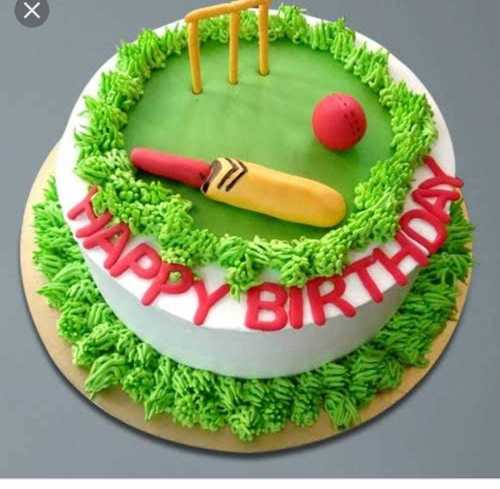 Cricket ball and bat cake