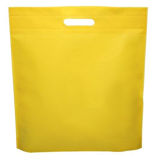 Easy To Hold, Carry And Durable Yellow Color Non Woven D Cut Handle Carry Bags