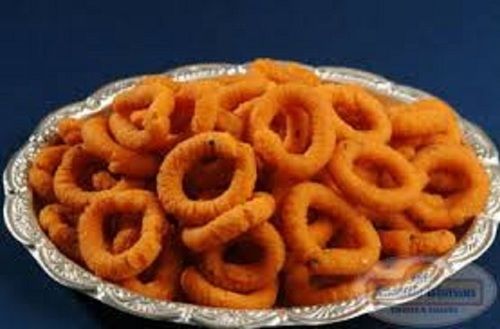 Red Coloured Andhra Masala Murukku Crunchy And Rich In Taste, Flavour 