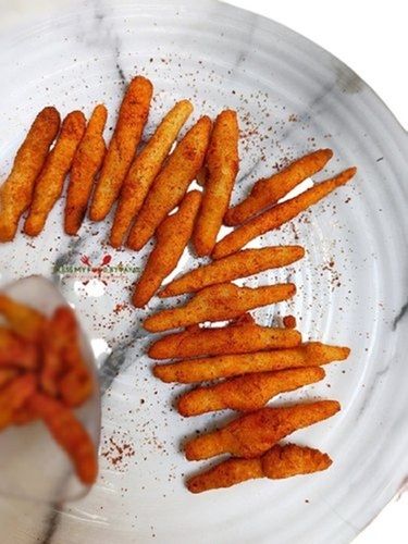 Spicy Masala Corn Sticks With Orange Colour And 1 Months Shelf Life, Delicious Taste