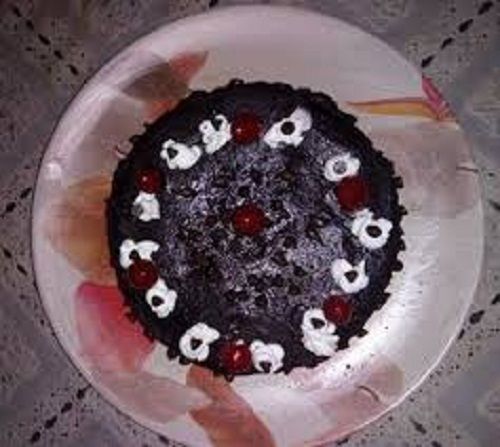 Black Forest Cake. Homemade. Fresh Cherrries with whipped cream