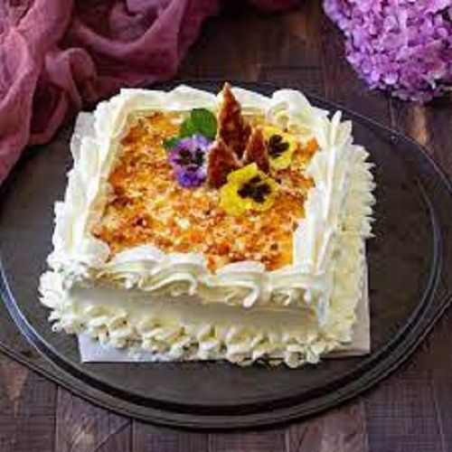 Delicious Sweet White And Yellow Designer Cream Homemade Cake