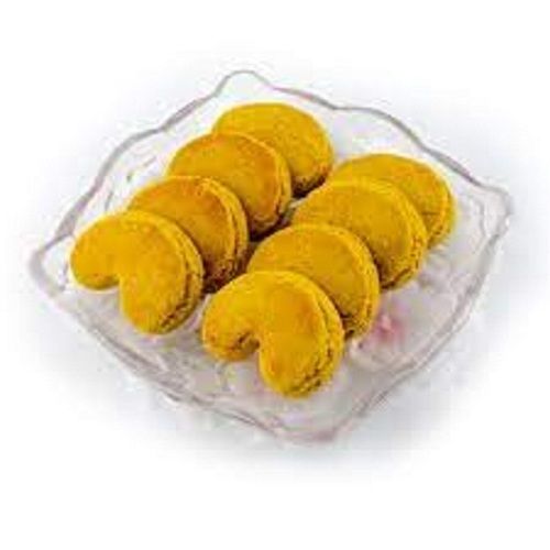 Delicious, Good For Health, Orange Colour And Tasty Banana Biscuit For Snacks  Texture: Crispy