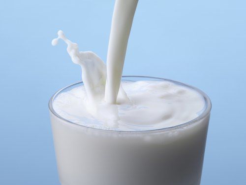 100 Percent Pure And Natural White Cow Milk Rich Calcium And Vitamin
