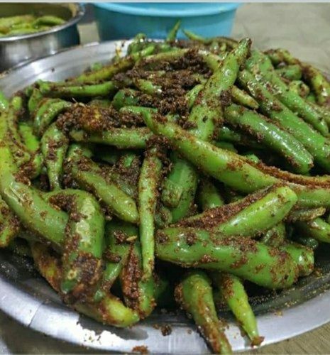 Hygienic Prepared Free From Impurities Good In Taste Spicy Green Chilli Dry Pickle