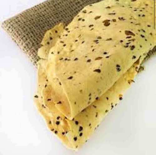 Light Yellow Ready To Eat Plain Salty Papad Served With Food