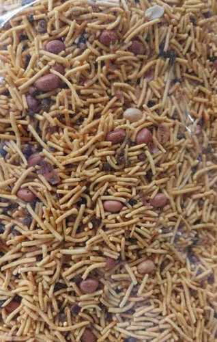 Spicy Besan Sev Namkeen With Roasted Peanuts For Tea Time Snacks  Carbohydrate: 14 Percentage ( % )