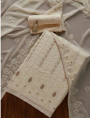 White And Golden Embroidered Cotton Polyester Unstitched Indian Suit For Ladies - Cotton Blend Fitted Design White and Golden Colors | Breathable Fabric Floral Detailing Scalloped Hemline Versatile for Office and Parties