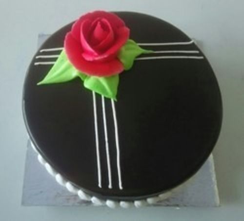 Fresh Chocolate Cake In Black Shade Yummy And Creamy With Flower 