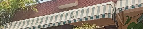 Sun Protection And Long Lasting Green And White Awning For Commercial