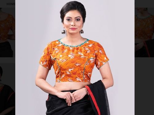 Indian Comfortable Orange Printed Women Blouse With Green Neckline For Party Wear