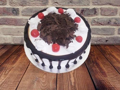 Black Forest Cake With Crushed Chocolate And Cherry Topping For Party Celebration