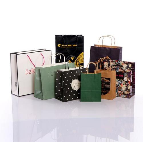  क्राफ्ट पेपर कैरी बैग विभिन्न रंगों और डिज़ाइनों में उपलब्ध है 