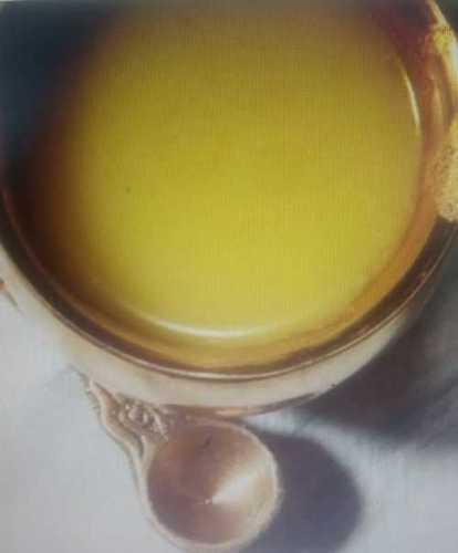 100% Pure Cow Desi Ghee Used As A Direct Flavoring On Food And Yellowish Colour