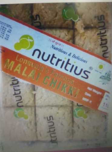 Nutritius Malai Chikki, Brownish Color, Protein 56.9 And Fat 130.4 Grade: Food