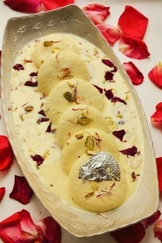 1 Kg Fresh Sweet And Delicious Fresh Round Topped With Dry Fruit Yellow Spongy Rasmalai