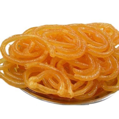  प्राकृतिक सामग्री से बनी गोल आकार की स्वादिष्ट मीठी नारंगी और मीठी सादी जलेबी 