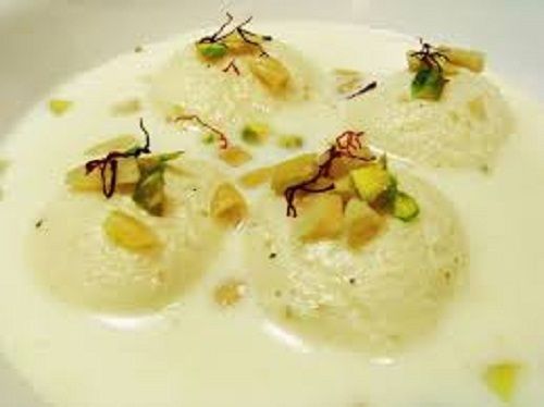 100% Pure Fresh Nutritent Enriched Round Yellow Sweet Spongy Rasmalai 