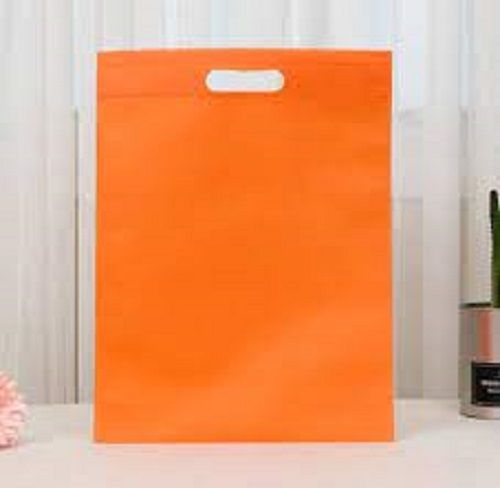 With Handle Orange Color Plain Non Woven D Cut 40 Gsm Bag For Shopping And Easy To Carry