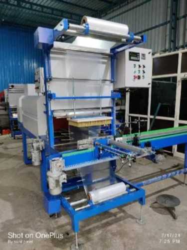 Metal Shrink Wrapping Machine, Automatic Grade And Blue Color Powder Coated Surface