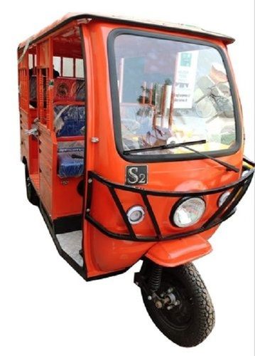 Four Seater Vehicle Orange And Black Battery Operated E Rickshaw