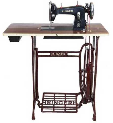 black singer sewing machine with table