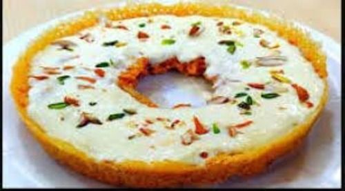 Tasty Malai Ghevar, Sweet In Taste, Made With Goodness Of Milk And Dry Fruits Carbohydrate: 13.3 Grams (G)