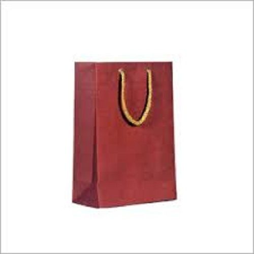 Durable And Long Lasting Comfortable Maroon Color Paper Carry Bag