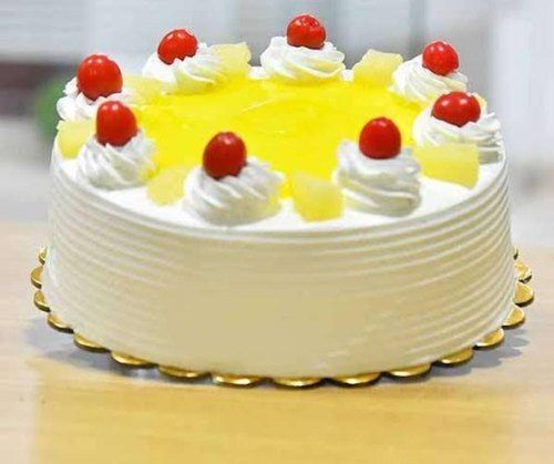 100% Fresh And Pure Cream Pineapple Yummy Delicious Cake With Cherry Toppings For Party
