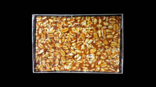 Sticky-Sweet Flavour And Texture Delicious Tasty Crushed Peanut Chikki 