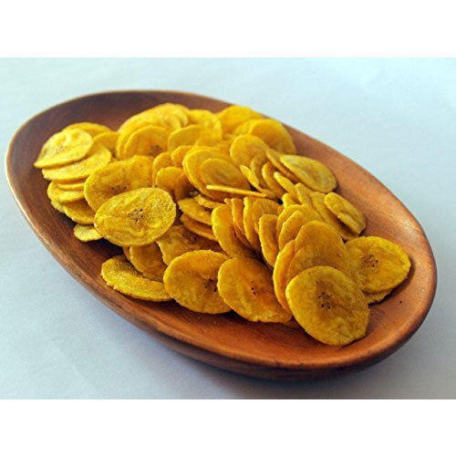 Yellow Yummy And Tasty Crispy Round Shape Delicious Healthy Banana Chips