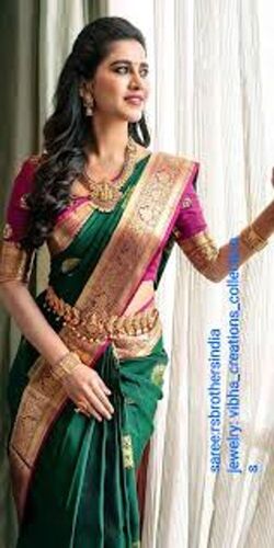 Photo of South Indian bridal look in green saree gold jewellery
