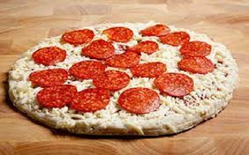 Heavenly Taste Delicious Veggie Topped Round Mozzarella Chees Loaded Pizza  Carbohydrate: 120 Grams (G)