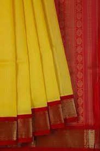 Plain  Stylish And Traditional Beautiful Festive Yellow Cotton Saree 