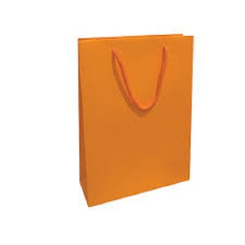 Environment Friendly And Recyclable Orange Paper Carry Bag With Rope Handle