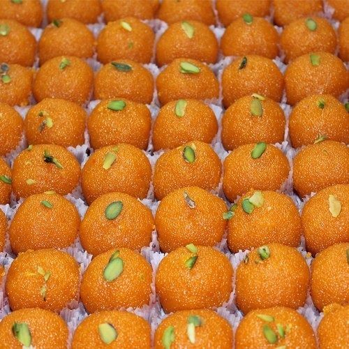 Orange Round Sweet And Delicious Boondi Laddu Made With Gram Flour Sugar And Vegetable Oil Carbohydrate: 13 Percentage ( % )