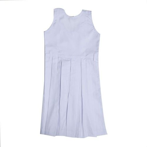 Plain Girls School Uniform With Sleeveless And White Colour, Cotton Fabrics Age Group: 10