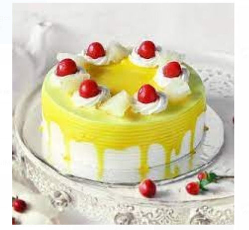 100% Fresh Pineapple And Mango Flavor Round Birthday Cake Topped With Cherry Fat Contains (%): 20 Grams (G)