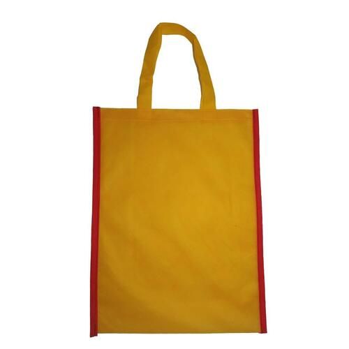 Washable And Eco Friendly Yellow Plain Non Woven Carry Bag With Handle 