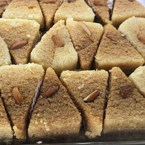 Pack Of 1 Kg Triangle Shape Sweet And Tasty White And Brown Milk Cake 