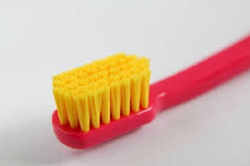 Durable Light Weight Red Yellow Adjusted Fibers Flexible Soft And Clean Plastic Toothbrush 